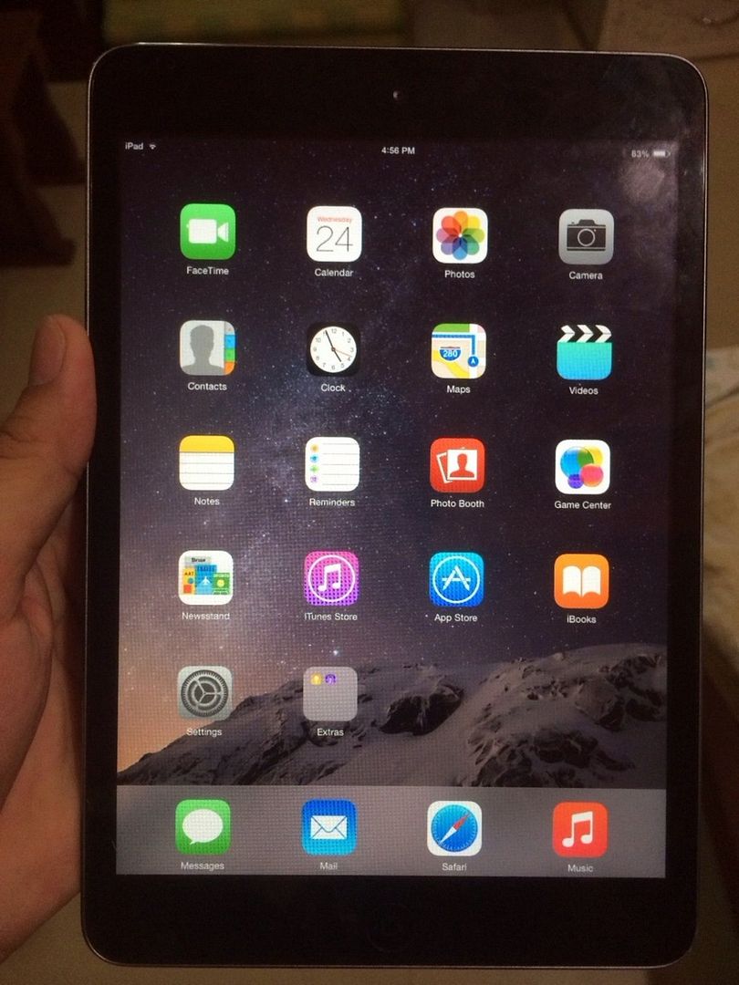 Cần bán ipad mini 1 màu tro giá rẻ do nứt kính 1 góc nhỏ