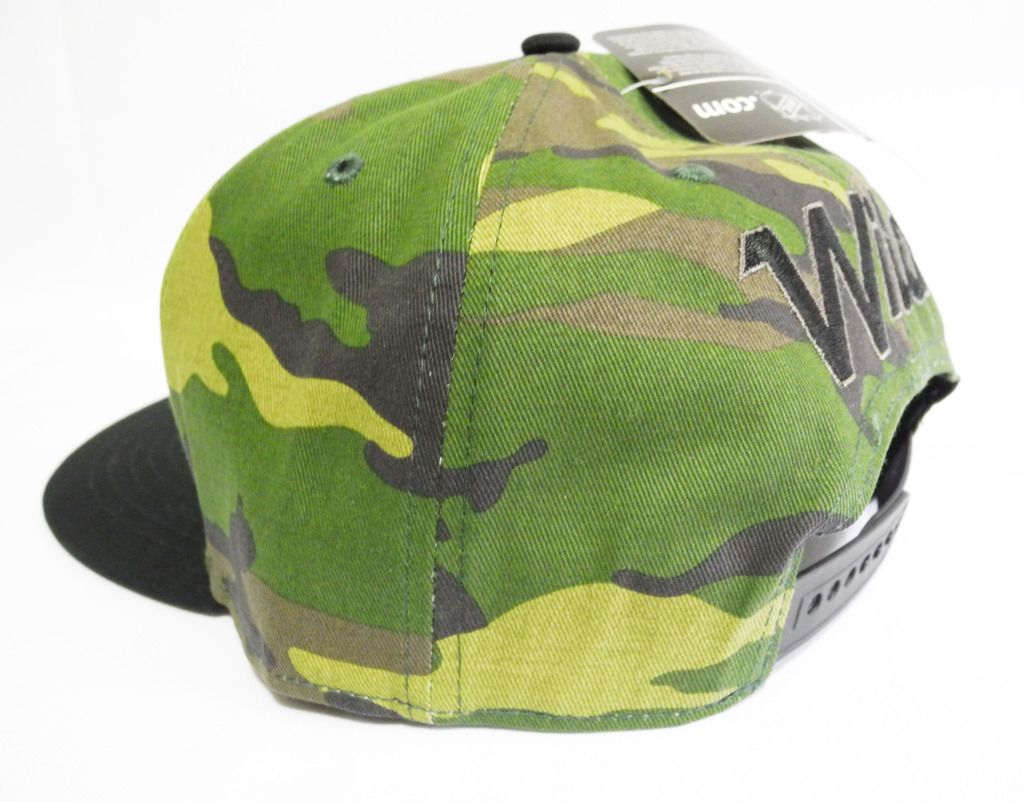 green ball cap