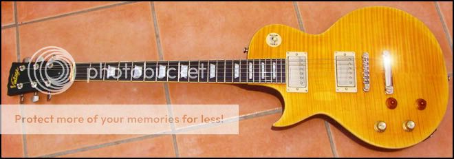 Para Esquerdinos!! Vintage-v100-lemondrop-left-handed-guitar